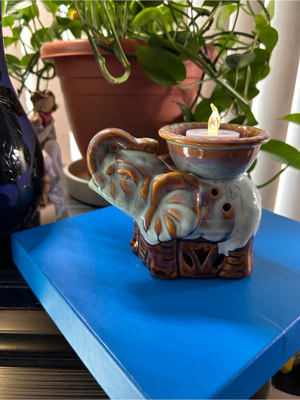 Handmade Ceramic Elephant Oil Burner in Blue and Brown
